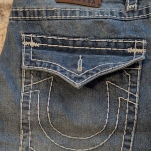 True Religion Light Blue Jeans with White Stitching